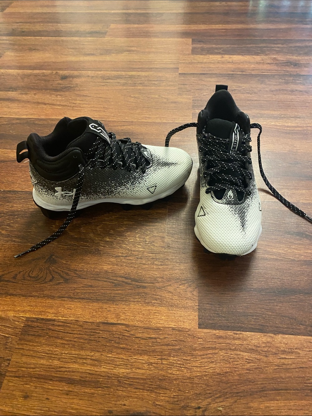 Under Armour Black and White youth football cleats